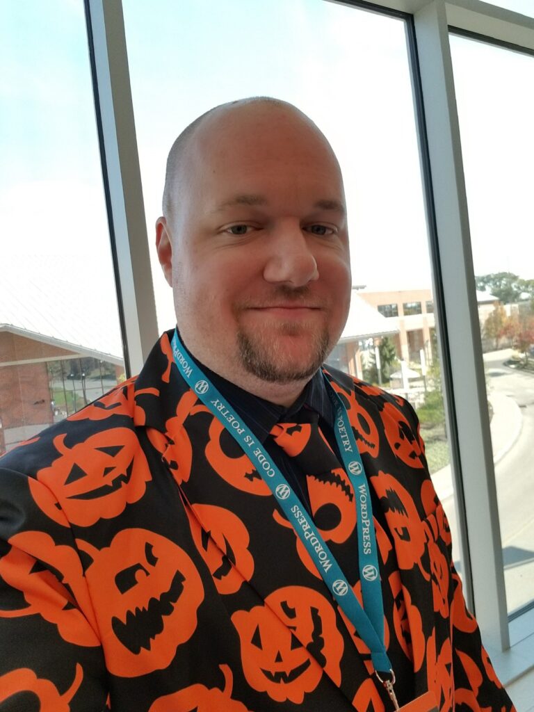 This is a selfie photo of Brad Williams, CEO. He is wearing his famous Halloween pumpkin suit.