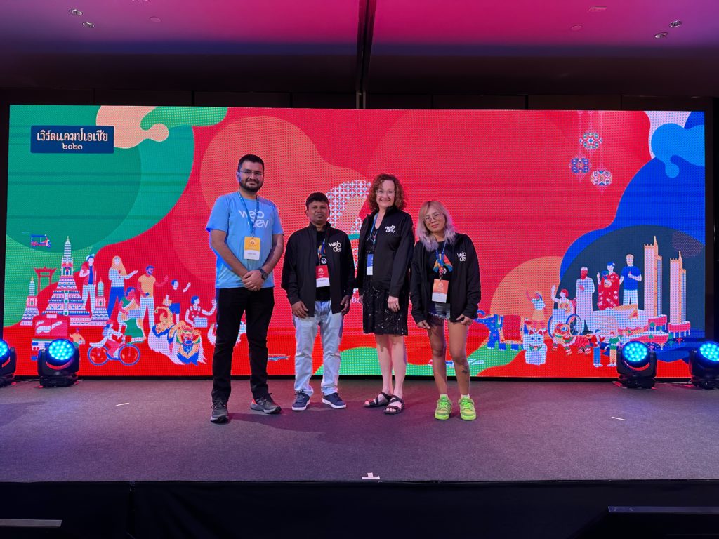 This is a photo of Lead Engineer, Ashar Irfan; Backend Engineer, Lax Mariappan; Account Manager, Laura Byrne; and Engineering Manager, JC Palmes, taken at WordCamp Asia in Bangkok, Thailand.