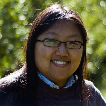 This is an outdoor portrait photo of Lindsey Bell, Frontend Engineer at WebDevStudios.